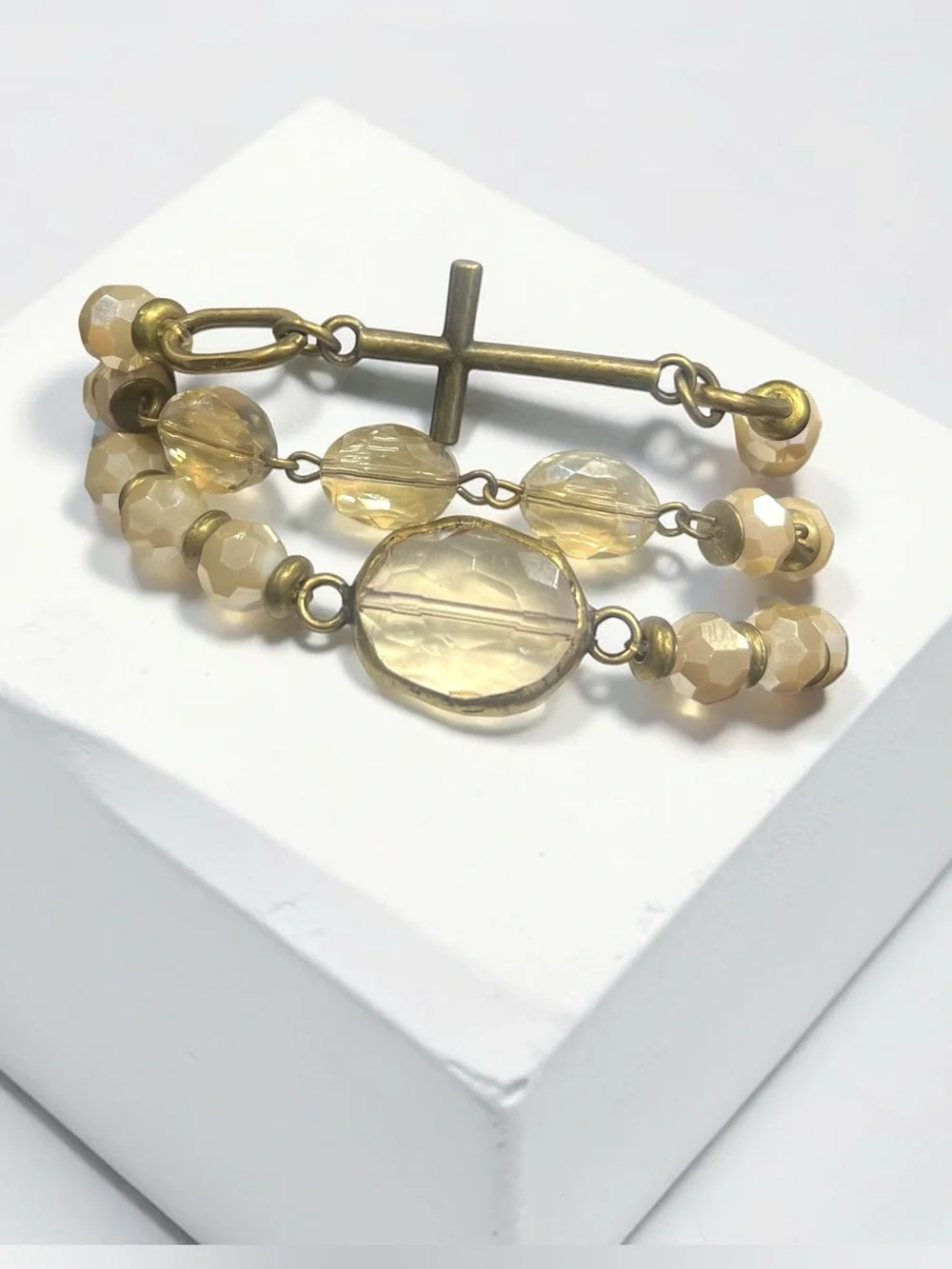 Elegant ivory-champagne Beaded Cross Bracelet